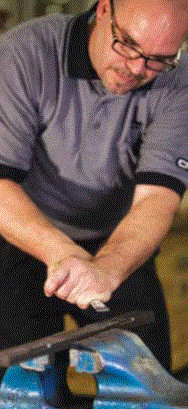Hand scraping uses simple tools to introduce fine texture to machine ways