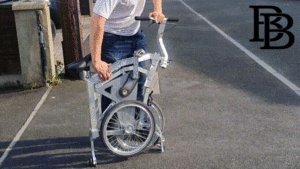 A gif of a person unfolding an e-bike.
