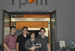 Amherst design team, and their cup holder