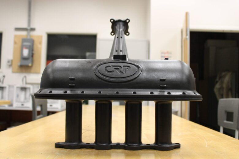 3D-printed intake made by CRP USA with Windform materials.