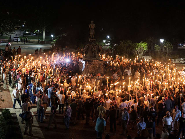 Several hundred white nationalists and white supremacists carrying torches marched through the University of Virginia campus on August 11, 2017 before clashing with a small group of counterprotestors. (Image courtesy of Evelyn Hockstein/The Washington Post.)