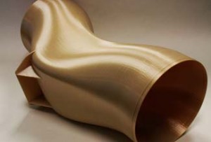Ultem builds in 0.010 in. and 0.013 in. layer thicknesses. The part stands at two feet long and one and a half feet in diameter.