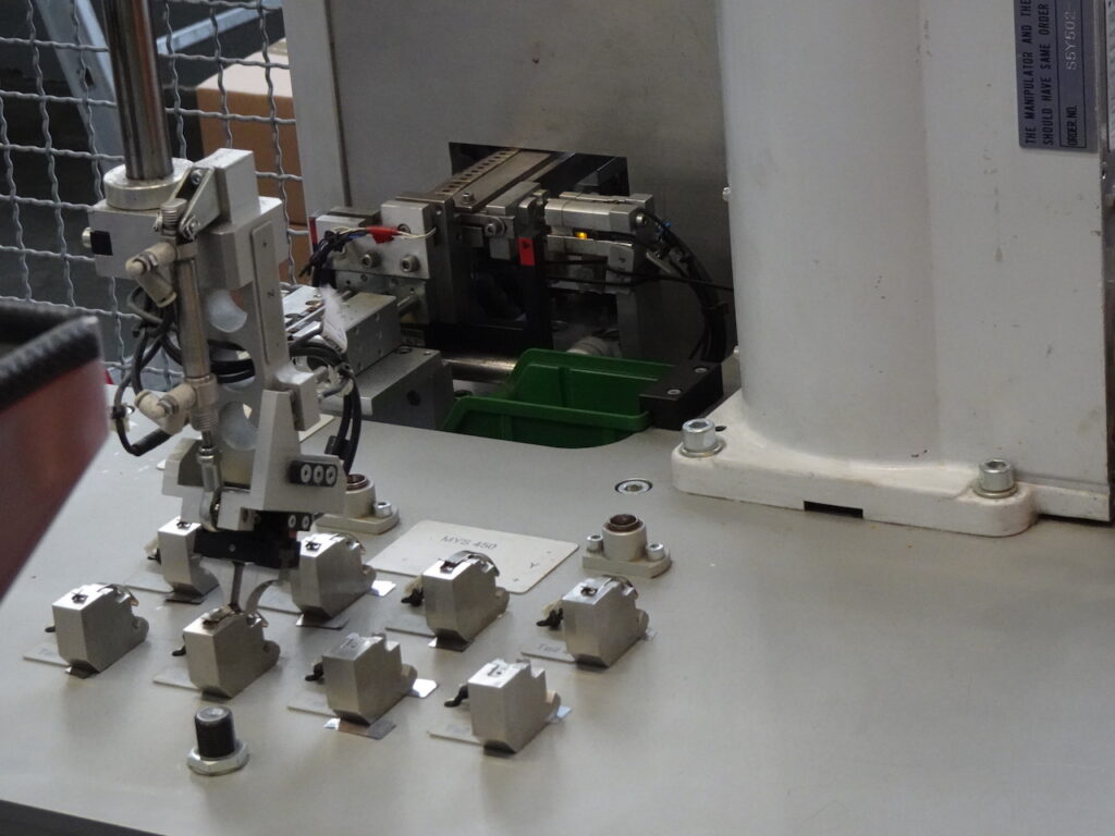 Hachtel handling system for springs
