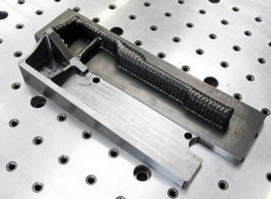 wire-frame based additive manufacturing