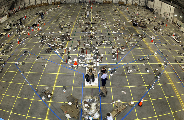 The grid on the floor of the RLV Hangar as workers in the field bring in pieces of Columbia's debris.
