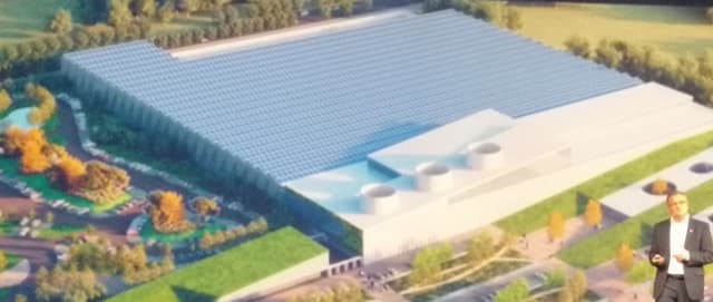 Norbert Hanke announcing Hexagon's new factory in Hongdao, China. (Image courtesy of the author.)