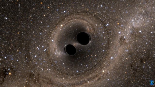 Computer simulation depicting two black holes colliding. (Image courtesy of SXS.)