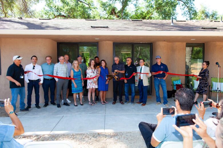 Representatives from Emergent, AccessHome, the City of Redding, Don Ajamian Construction, and more at the ribbon cutting at the inauguration of California’s first 3D printed house.